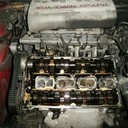 Op 16 maart was het dan na vele plezierige kilometers weer zover. Operatie distributieriem vernieuwen in Mariaparochie (Almelo) bij Apri Motoren Service. Een superspecialist voor Alfa, direct in mijn achtertuin. Hier een aantal technische foto's van de nieuwe distributie riem set + rollen, nieuwe balansas riem set + rol	en nieuwe waterpomp. Natuurlijk helemaal goed afgesteld rijdt mijn Spider 916 weer als nieuw. Ik kan het iedereen aanraden die (nog) op zoek is naar een echte Alfa specialist naar Apri te gaan: AMS v.o.fApri Motoren Service. Revisie & InstallatieAlmeloseweg 1827614 LB MariaparochieTel.: 00 31 (0)6 26650889amsinfo@aprimotorenservice.nlwww.aprimotorenservice.nl